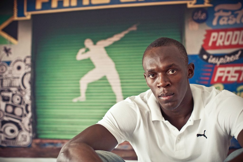 bolt running puma brand sport shooting photo Kingston