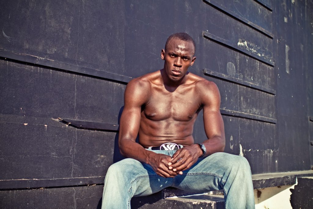 bolt running puma brand sport shooting photo Kingston