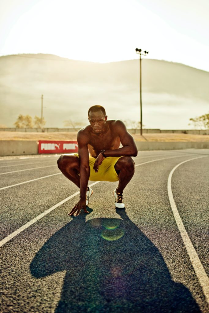 bolt running puma brand sport shooting photo Kingston
