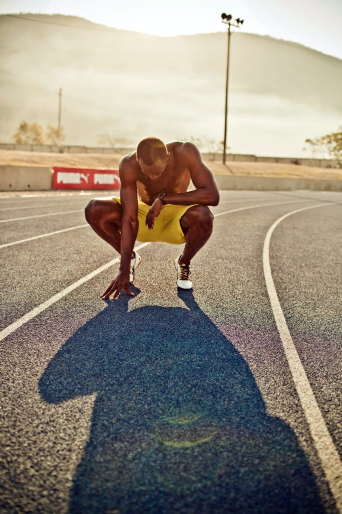 bolt running puma brand sport shooting photo Kingston